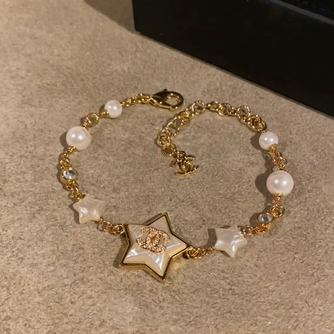Chanel Pearl Star Necklace Bracelet Earrings